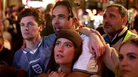 Group watching England World Cup match