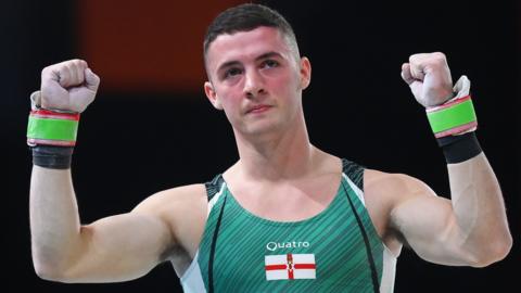 Defending pommel horse champion Rhys McClenaghan looks happy with his qualifying performance in Birmingham