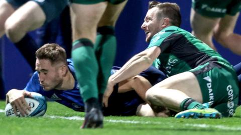 Jordan Larmour shakes off Jack Carty's attempt tackle to score Leinter's fourth try at the RDS