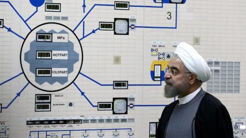 File photo showing Iranian President Hassan Rouhani visits the control room of the Bushehr nuclear power plant in Iran (13 January 2015)