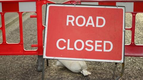 Road closed sign