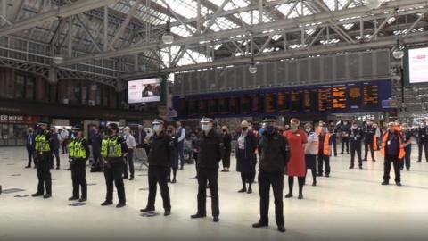 One minute silence in Glasgow Central