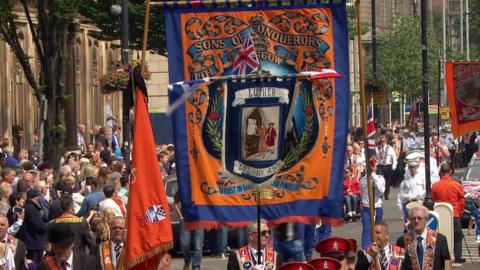 Orange Order members on parade in Belfast on 12 July 2016