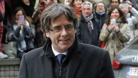 Catalonia's sacked former president Carles Puigdemont arrives to speak to journalists at the Press Club in Brussels, Belgium, on 31 October