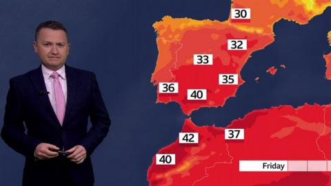 Matt Taylor stands in front of a weather map of Spain, Portugal and north-western Africa showing the heat expected this week