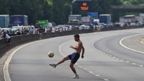 Man playing football on M4