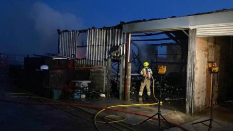 A firefighter at the scene