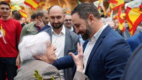 Presidential candidate for the Spanish far-right party Vox Santiago Abascal (C) greets supporters before a campaign rally in Burgos, northern Spain on April 14, 2019, ahead of the April 28 general elections