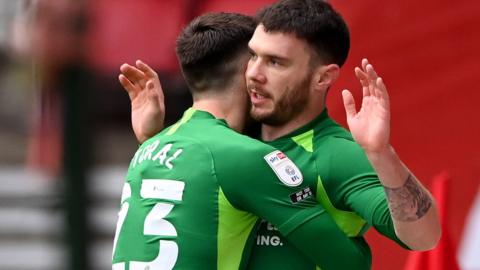 Scott Hogan celebrates his goal against Middlesbrough with Jon Toral