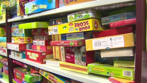 A shelf full of toys