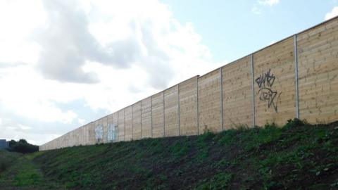 The fence along the A6