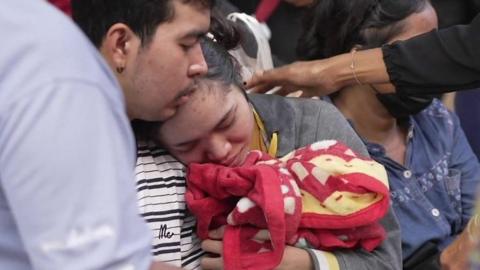 Mourners at temple