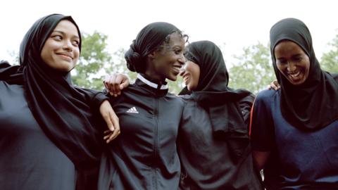 Yasmin Abdullahi (second left) with fellow team members of Sisterhood FC