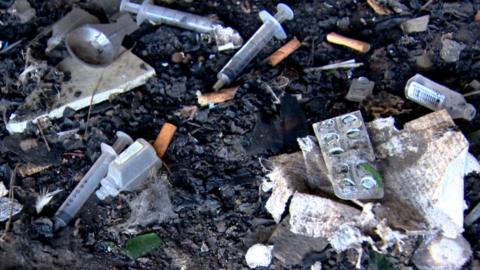 Discarded drug injecting equipment