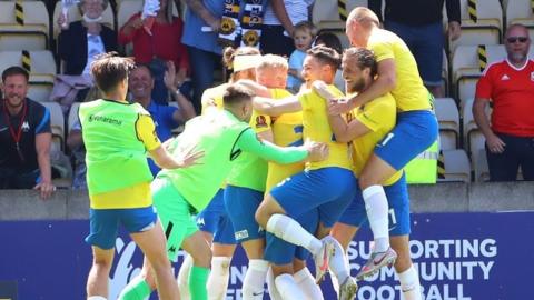 Torquay celebrate a goal against Notts County