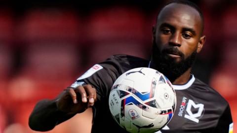 Hiram Boateng in action for MK Dons