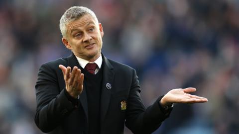 Ole Gunnar Solskjaer gestures during a match in his time as Manchester United manager
