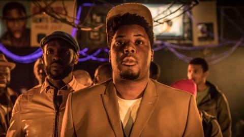 Hammed Animashaun and Sule Rimi in Barber Shop Chronicles