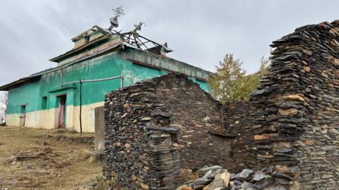 The church of Amanuel Maago in Negash, Tigray, shows damage that residents say was caused by a mortar bombing that killed several civilians sheltering outside it during the two-year civil war