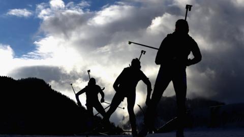 Biathletes in action