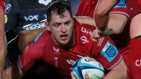 Scarlets' Ryan Elias looks for support