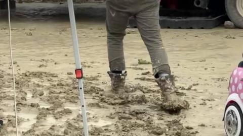 Muddy ground at Burning Man festival