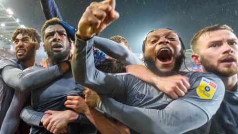 Cardiff celebrate Cedric Kipre's winner