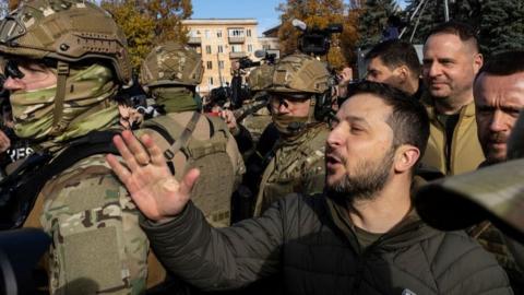 Ukrainian President Volodymyr Zelensky with military escort in Kherson, 14 Oct 22