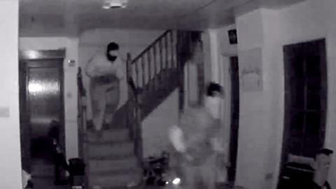 CCTV footage of two people in a house