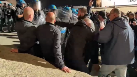 Naples police and England fans clash outside the Diego Armando Maradona Stadium
