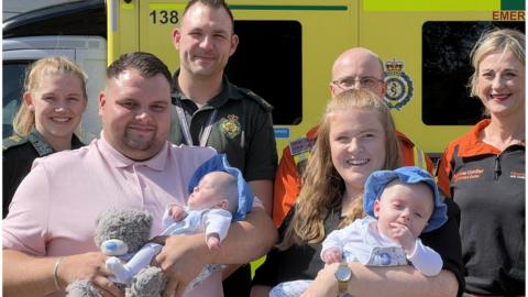 Medical staff meeting twins born prematurely