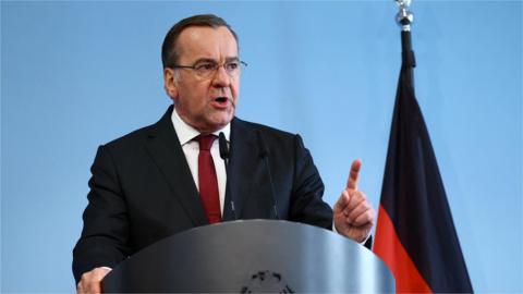 German Defence Minister Boris Pistorius standing at a lectern