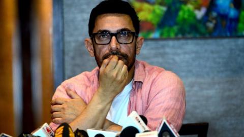 Bollywood actor Aamir Khan talks to media during an event held to celebrate his 57th birthday in Mumbai on March 14, 2022.