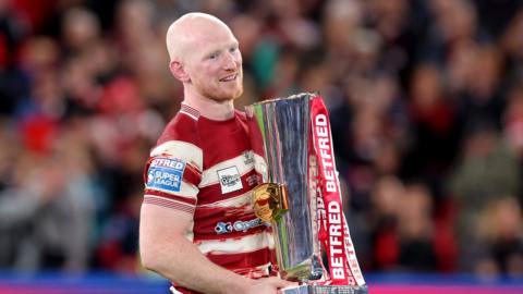 Wigan captain Liam Farrell with the Super League trophy