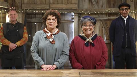 BBC handout photo of The Repair Shop, Comic Relief special (left to right) Steve Fletcher, Jennifer Saunders, Dawn French, Jay Blades, as French and Saunders will reprise their popular characters The Extras for a sketch set in The Repair Shop.