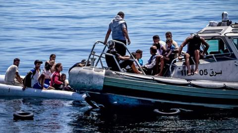 The Tunisian coast guard's speed boat seizes yet another vessel. This time an inflatable dinghy