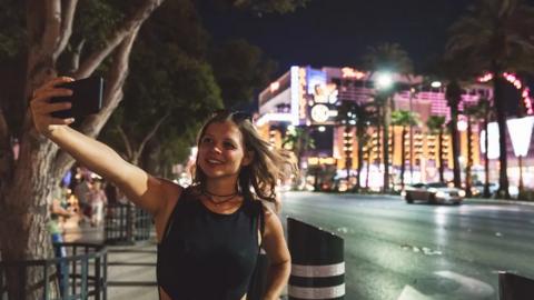 Woman taking selfie in Las Vegas