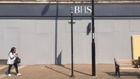 Boarded-up building in Northampton town centre which used to house BHS.