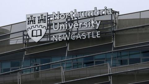 Northumbria University logo on the side of a building