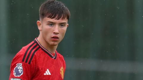 Daniel Gore in action for Manchester United's Under-21 side