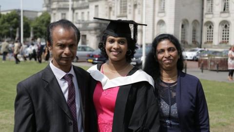 Vithiya Alphons with her parents