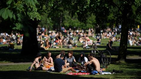 People gather in a park