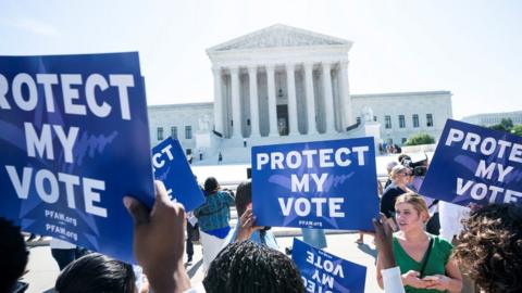 Immigration protesters outside the US Supreme Court, 27 June