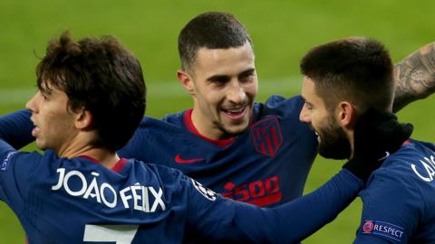 Yannick Carrasco of Atletico celebrates scoring against Red Bull Salzburg