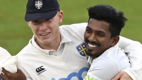 Matt Potts and Vishwa Fernando celebrate for Durham