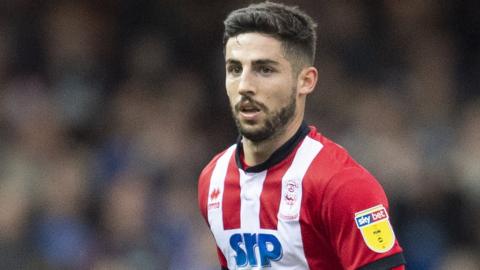 Tom Pett in action for Lincoln City