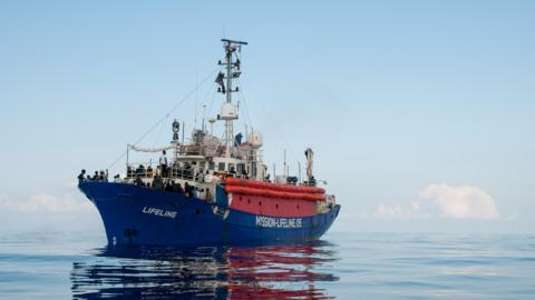 This handout picture by German NGO Mission Lifeline shows migrants onboard the Lifeline sea rescue boat at sea on 21 June 2018