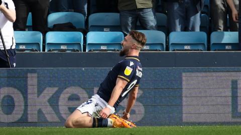 Tom Bradshaw celebrates