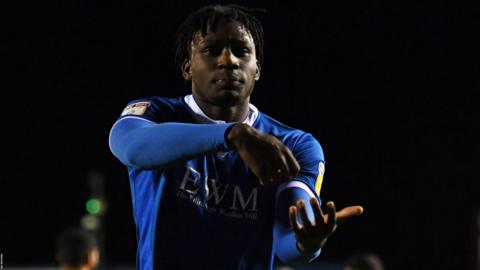 Josh Kayode of Carlisle United celebrates scoring their second goal