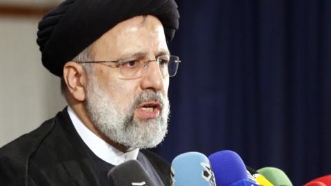 Ebrahim Raisi speaks after registering his candidacy for the Iranian presidential election in Tehran (15 May 2021)